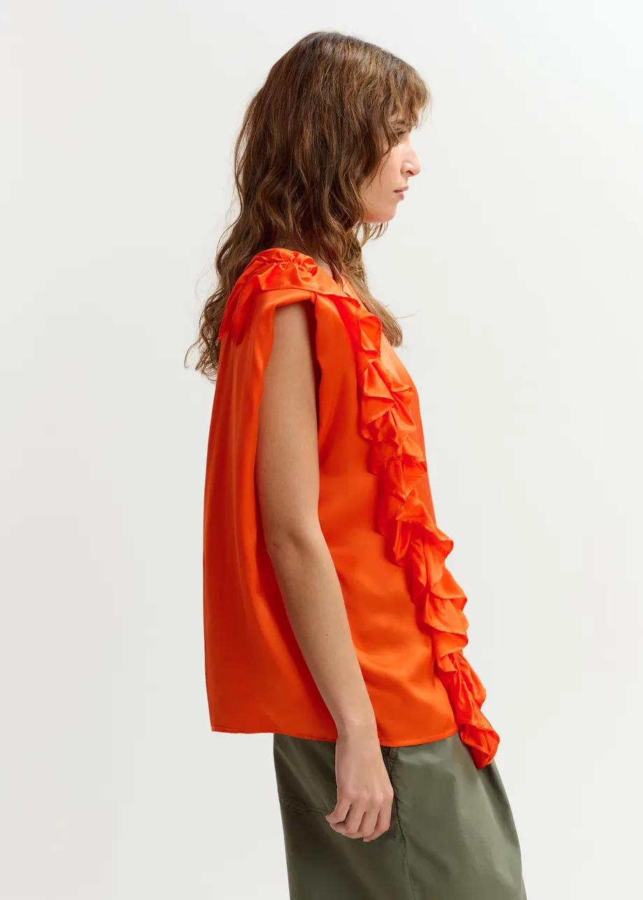 Orange sleeveless top with ruffle detail 