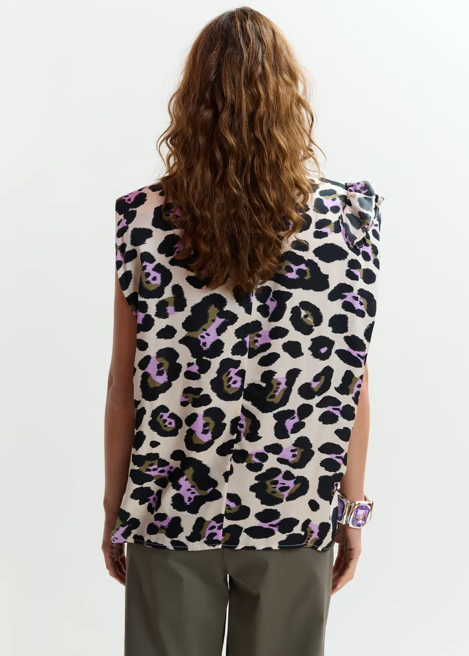 Off-white, black and purple sleeveless top with ruffle detail 