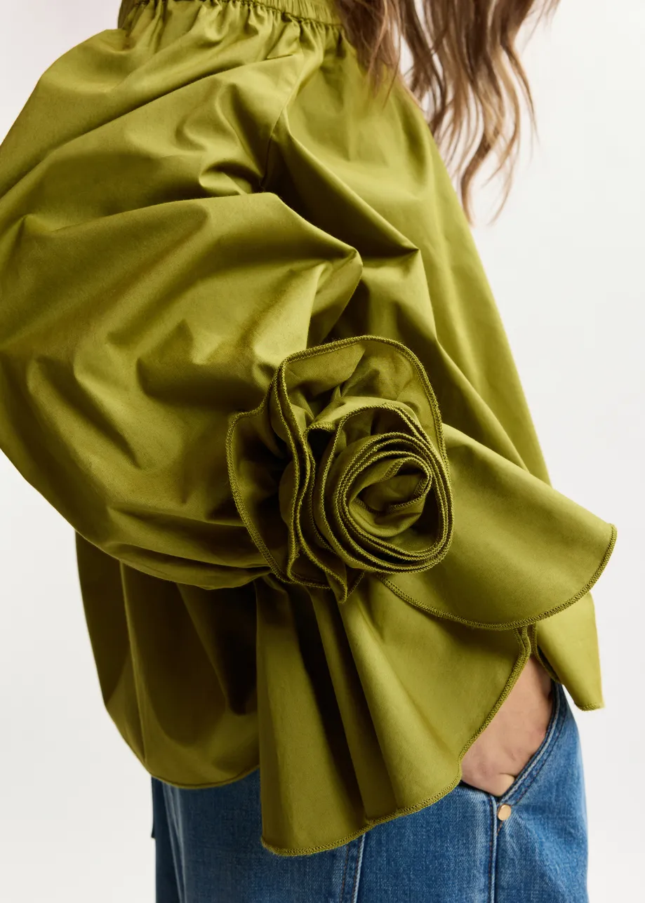 Grünes, trägerloses Baumwolloberteil mit Rosettendetails