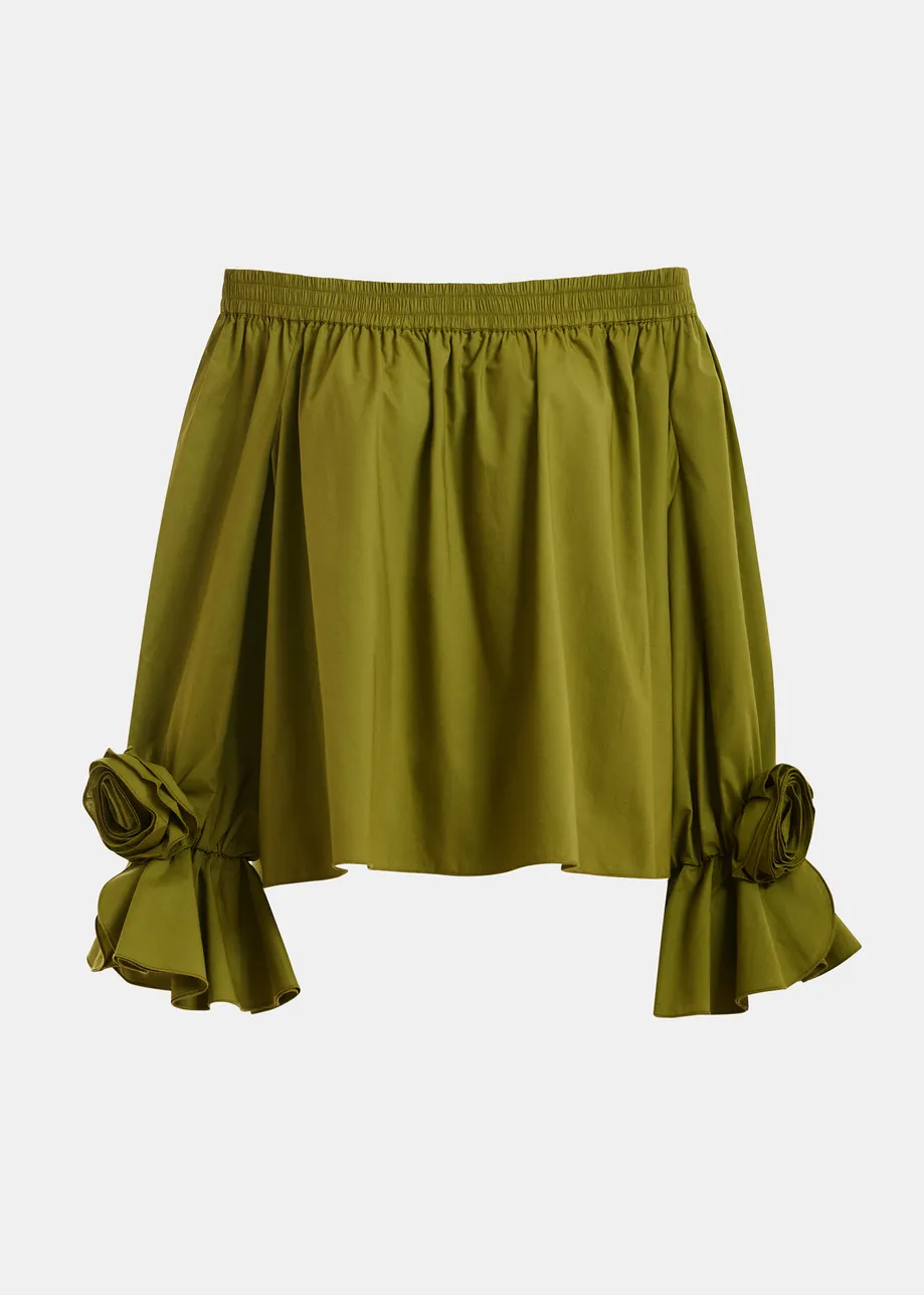 Top verde in cotone senza spalline con dettagli a rosa