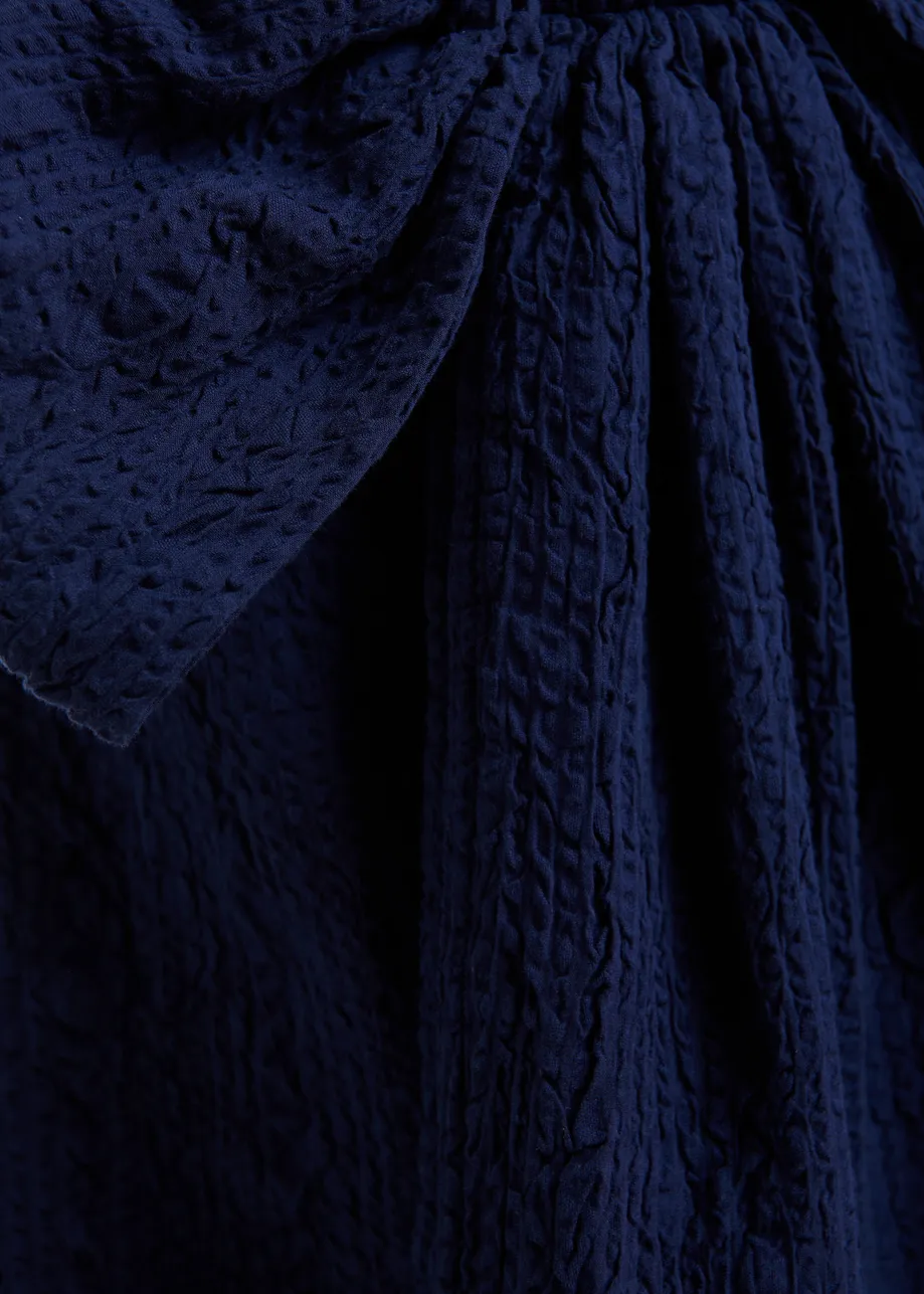 Dark blue cotton top with bow detail