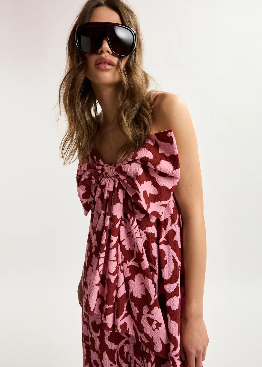 Pink and dark red floral print babydoll midi dress with bow detail