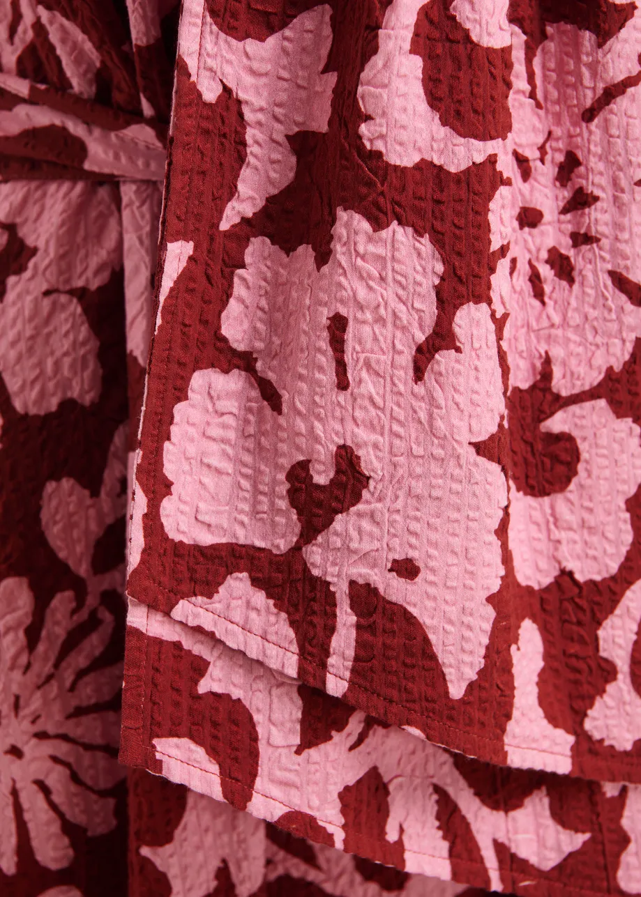 Pink and dark red floral print babydoll midi dress with bow detail