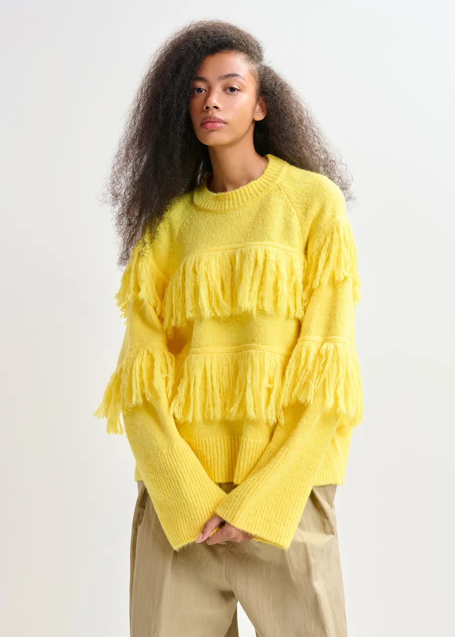 Yellow sweater with fringe details