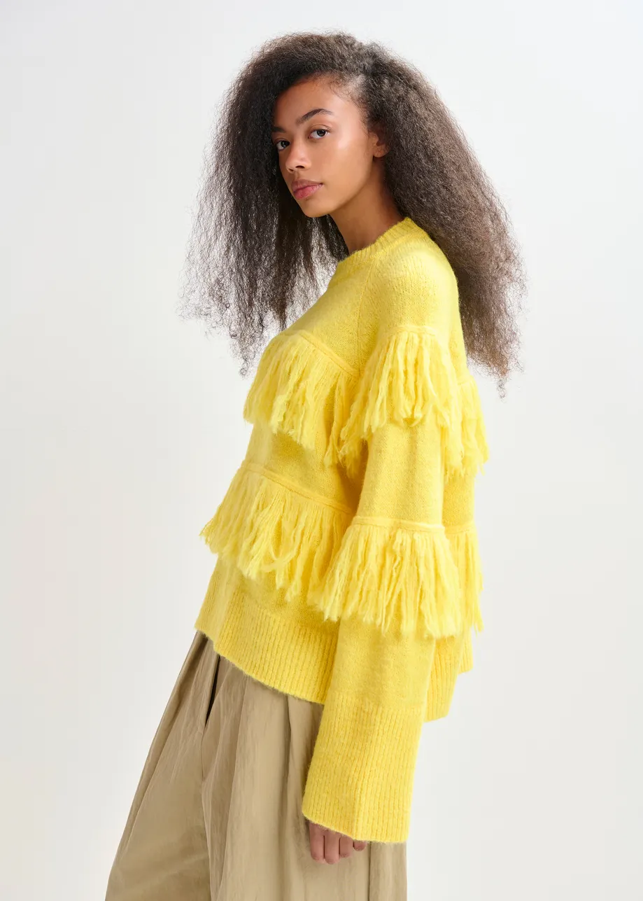 Yellow sweater with fringe details