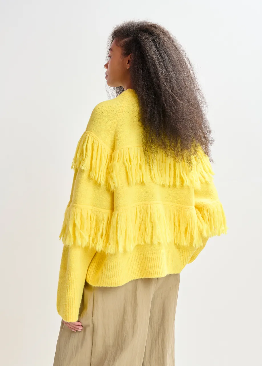 Yellow sweater with fringe details