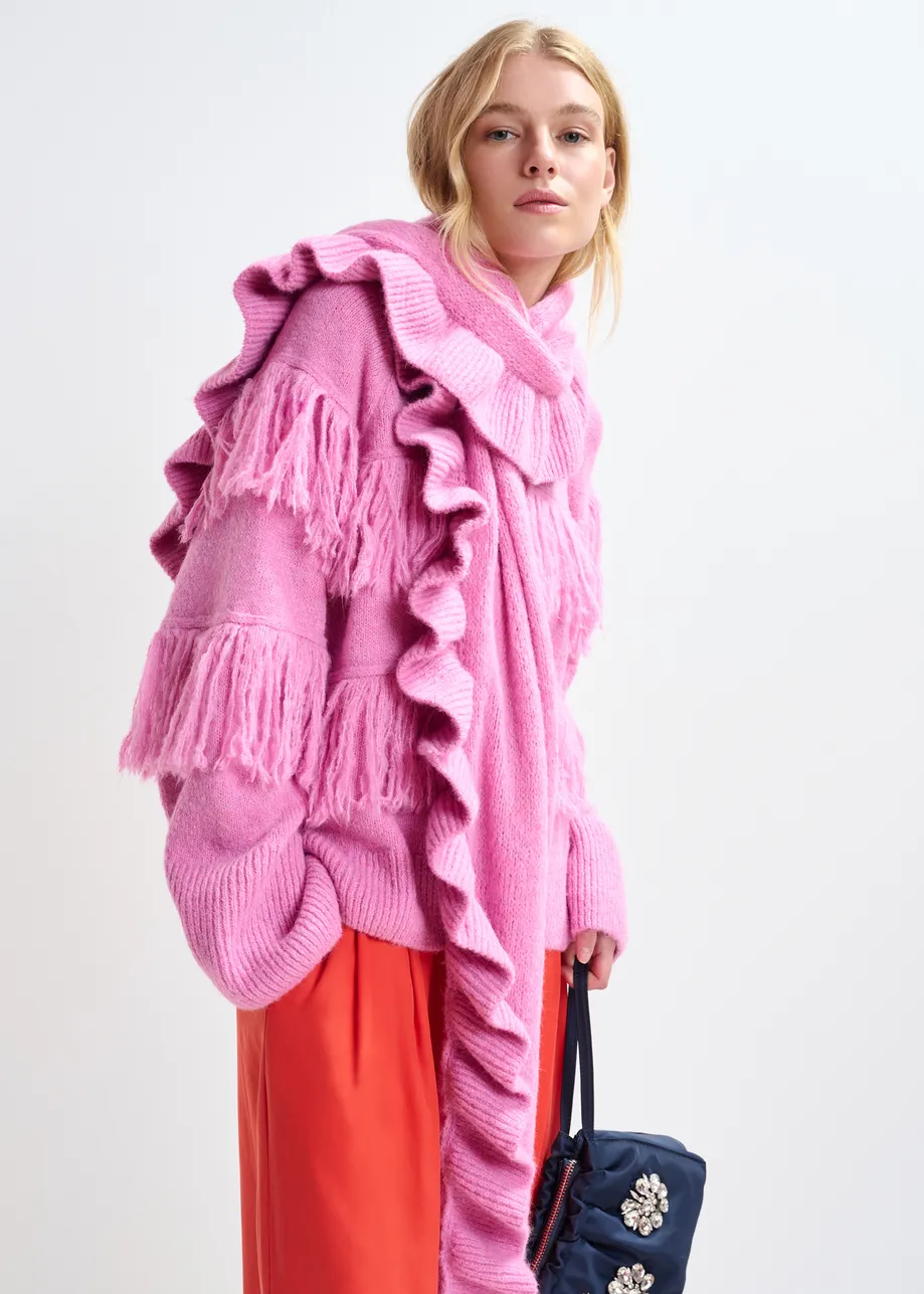 Pink sweater with fringe details