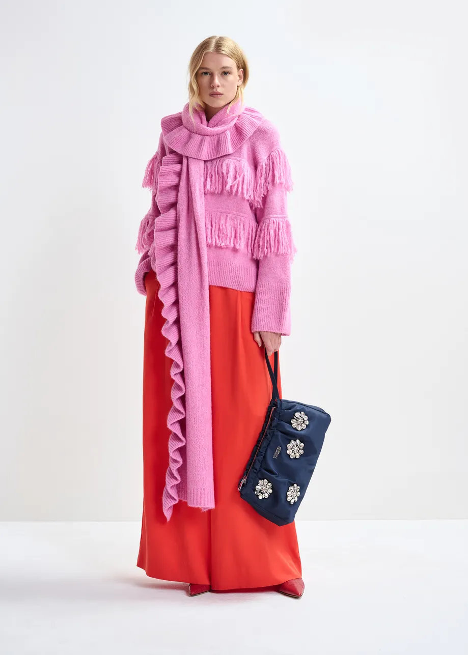 Pink sweater with fringe details