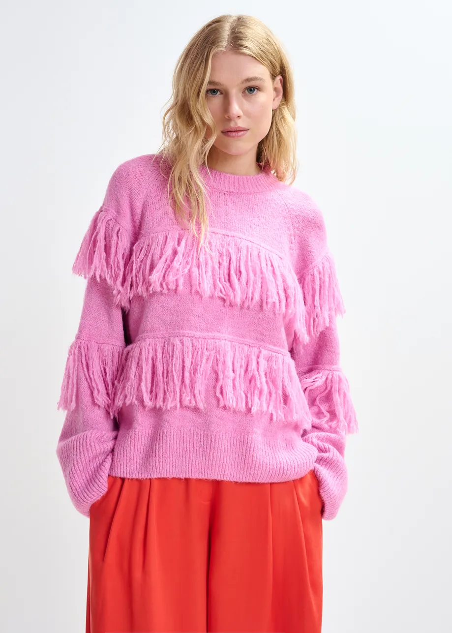 Pink sweater with fringe details