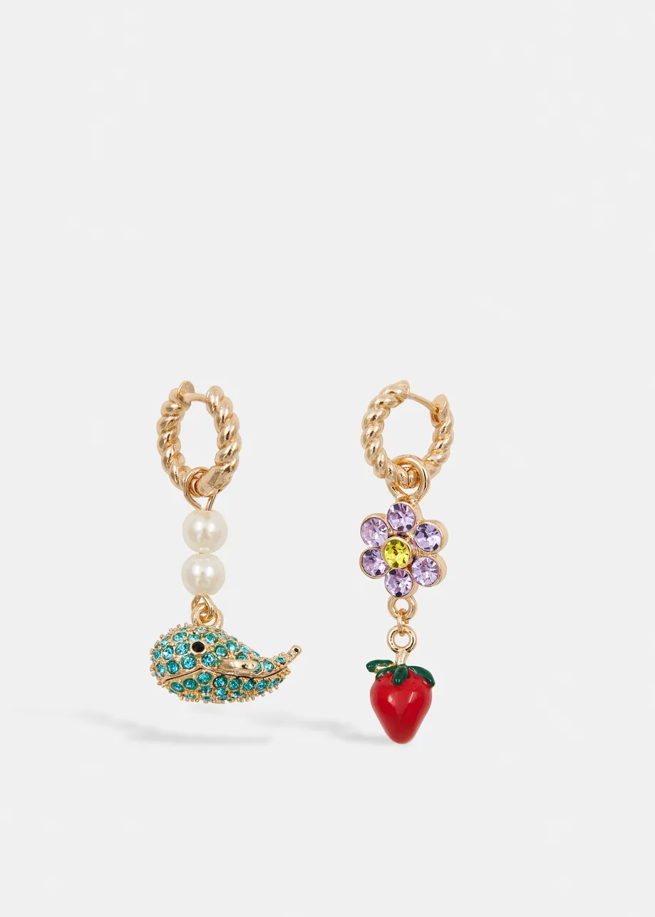 Gold earrings with blue whale and red strawberry
