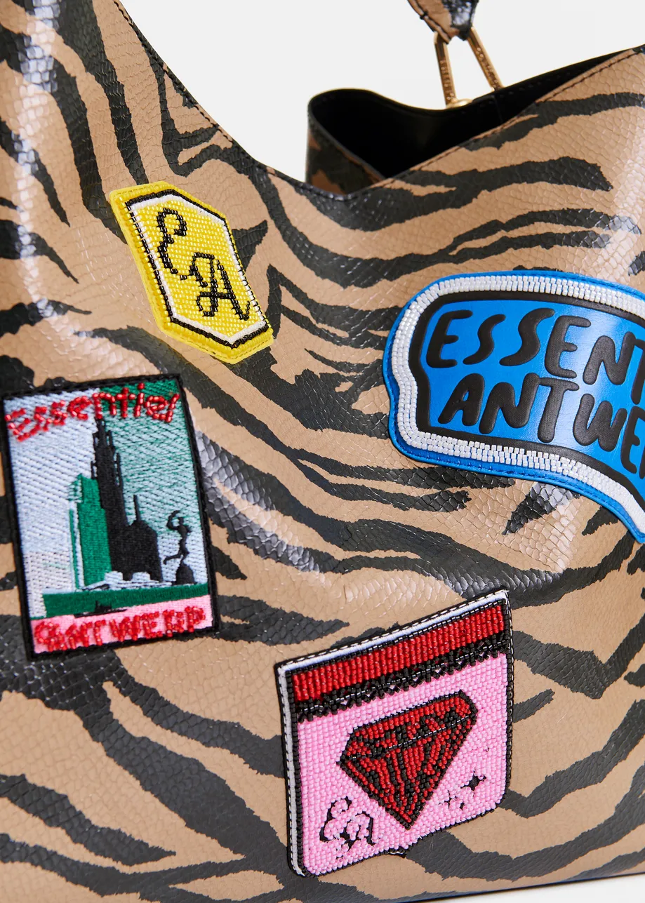 Brown and black tiger print glossy shopper bag with multicolor appliqued patches