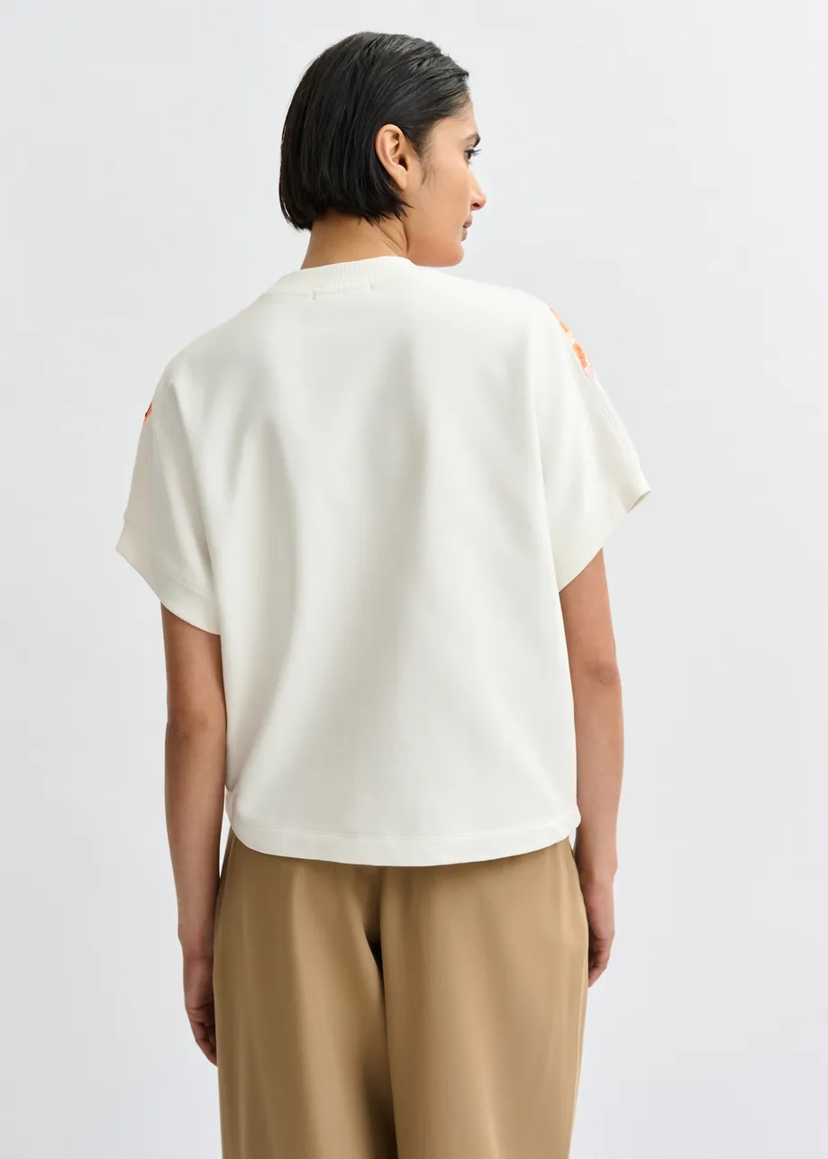 Sudadera de algodón con adornos de plumas, blanco roto