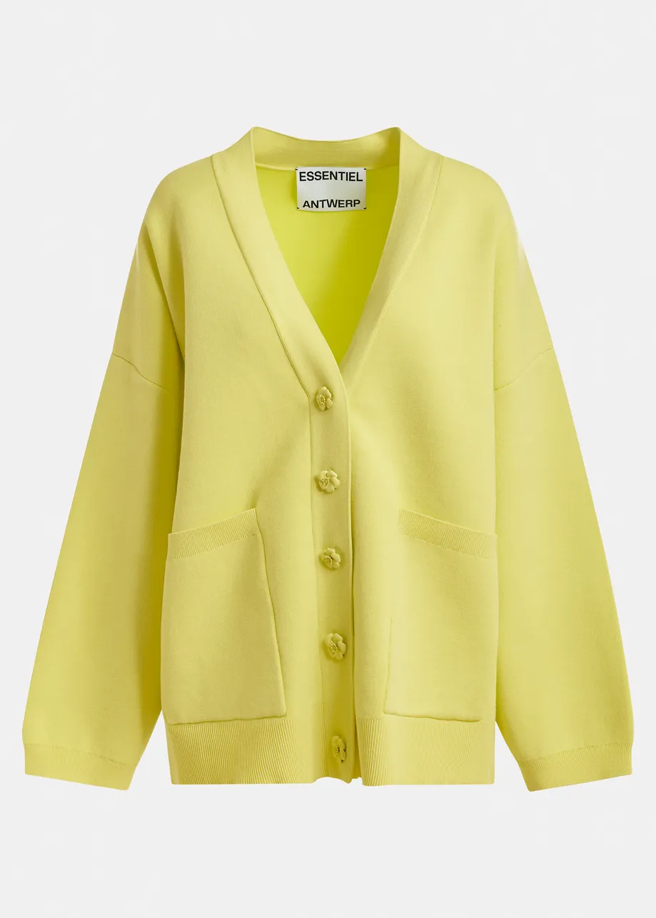 Gele cardigan met bloemknopen