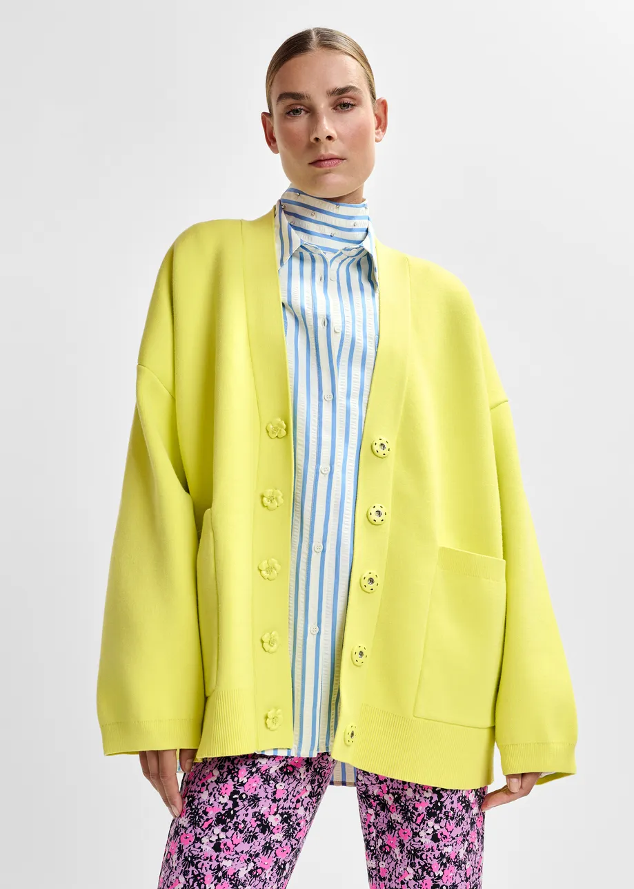Yellow knit cardigan with tonal flower buttons
