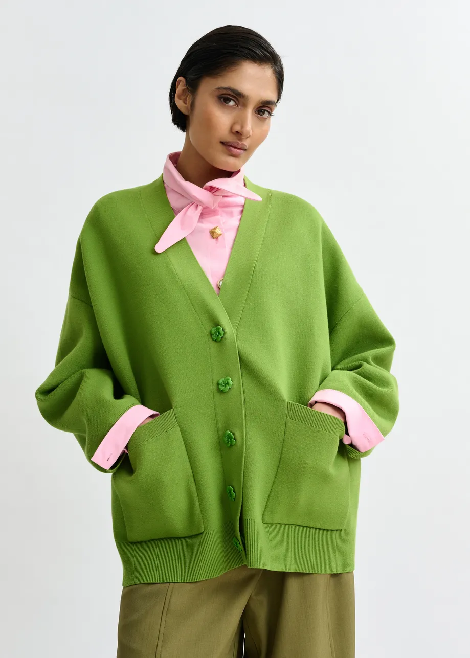 Groene cardigan met bloemknopen
