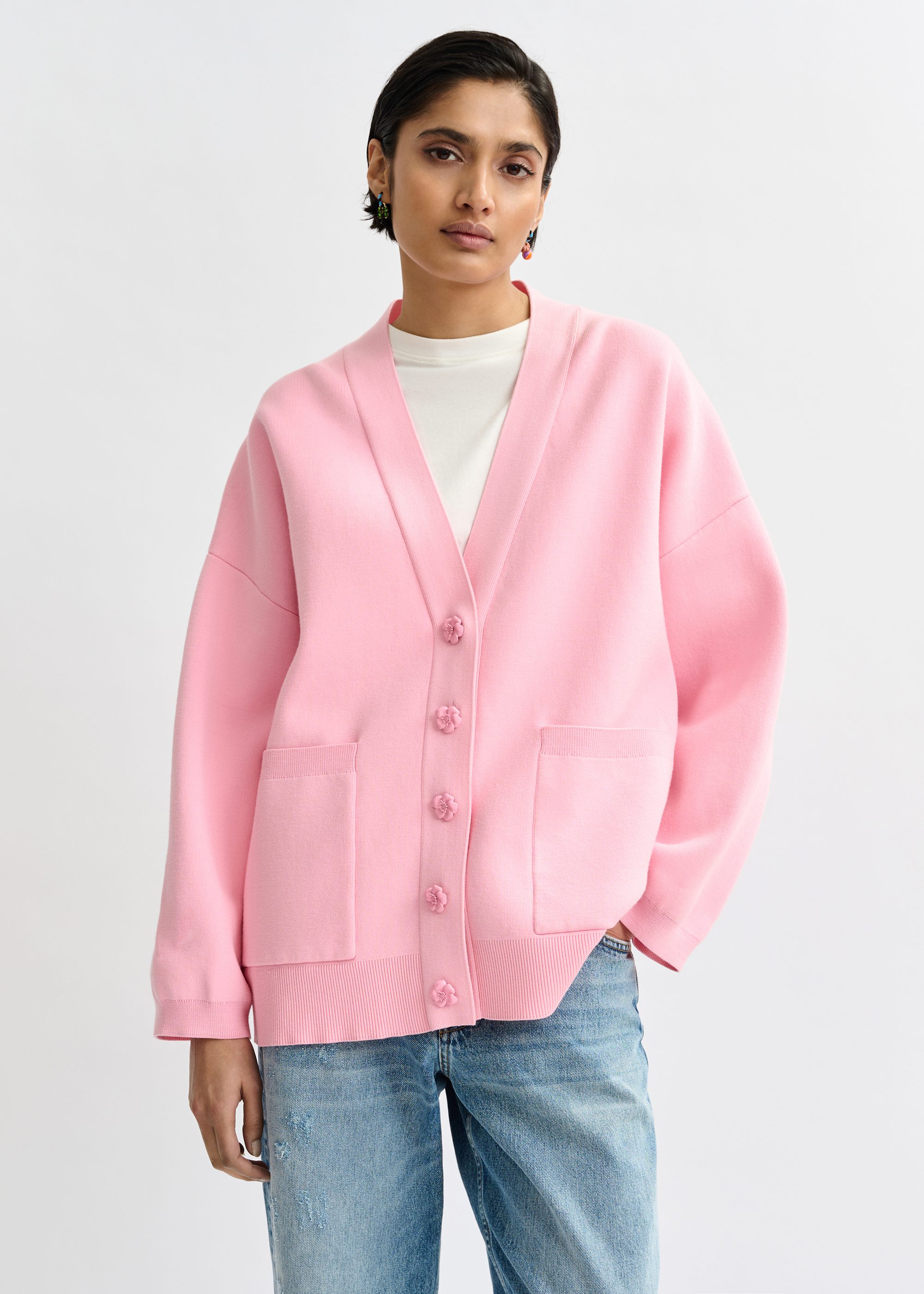 Pink knit cardigan with tonal flower buttons | Essentiel Antwerp