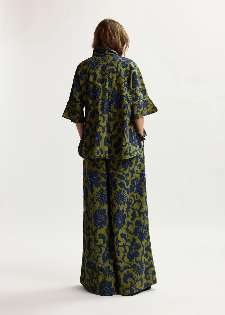 Green and dark blue wide-leg pants with contrast stitching