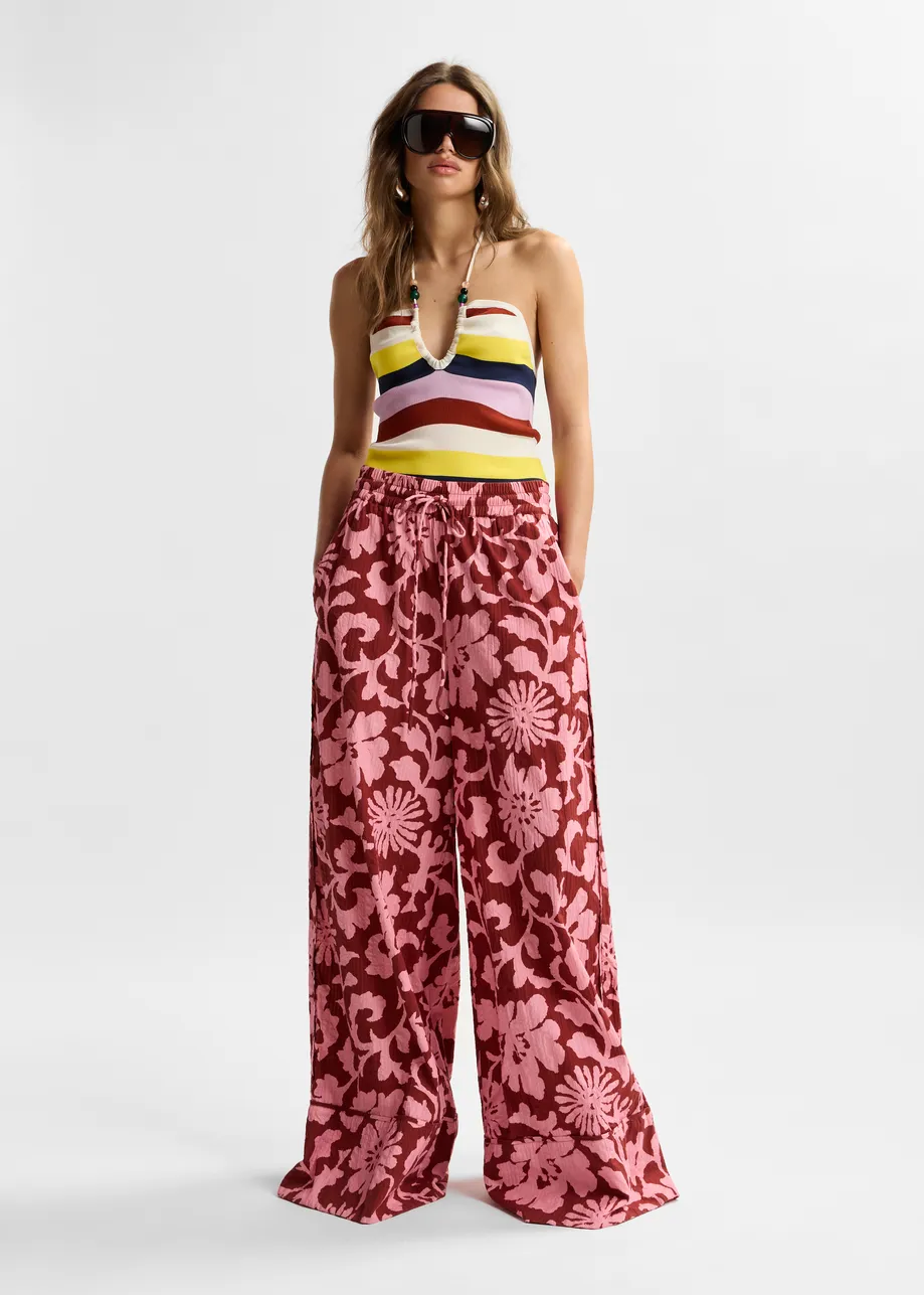 Pink and dark red wide-leg pants with contrast stitching