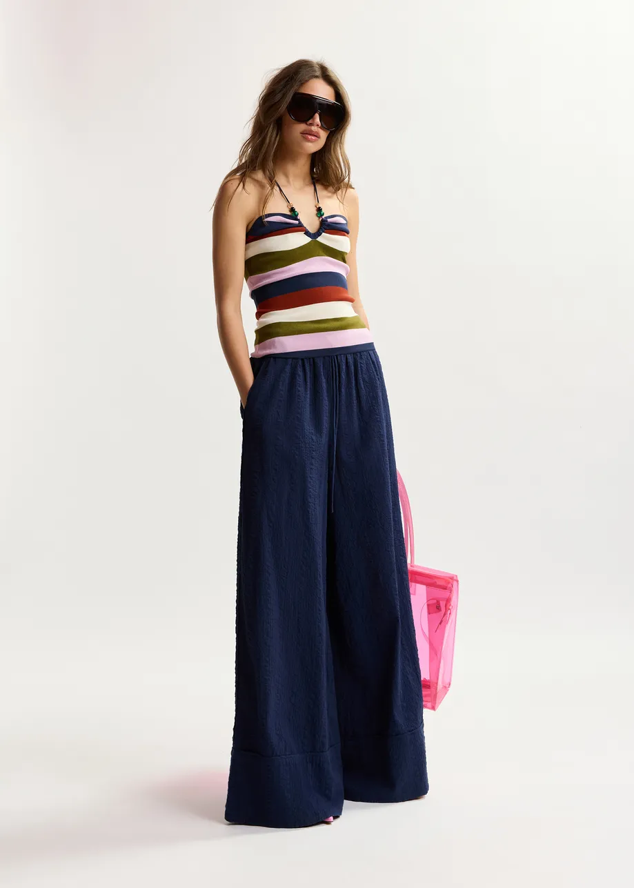 Pantaloni larghi blu scuro con cuciture a contrasto