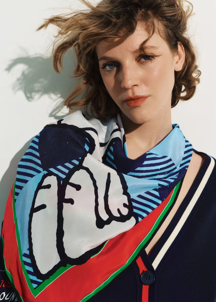 Blue, black and red Peanuts™ Snoopy check-print scarf