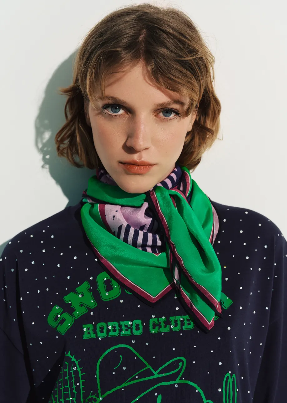 Pink, green and navy Peanuts™ Snoopy check-print scarf