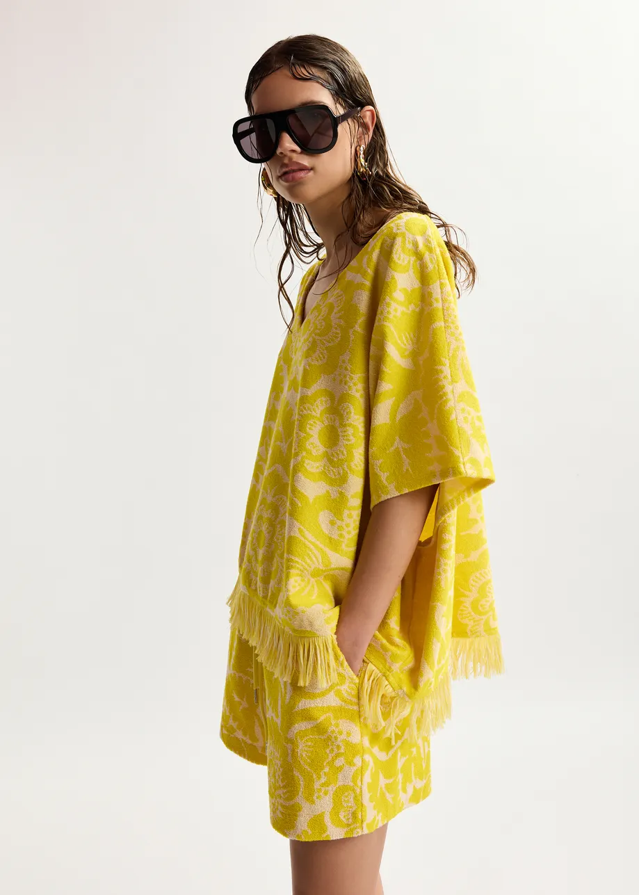 Maglia in misto cotone jacquard con motivo floreale giallo testurizzato e frange