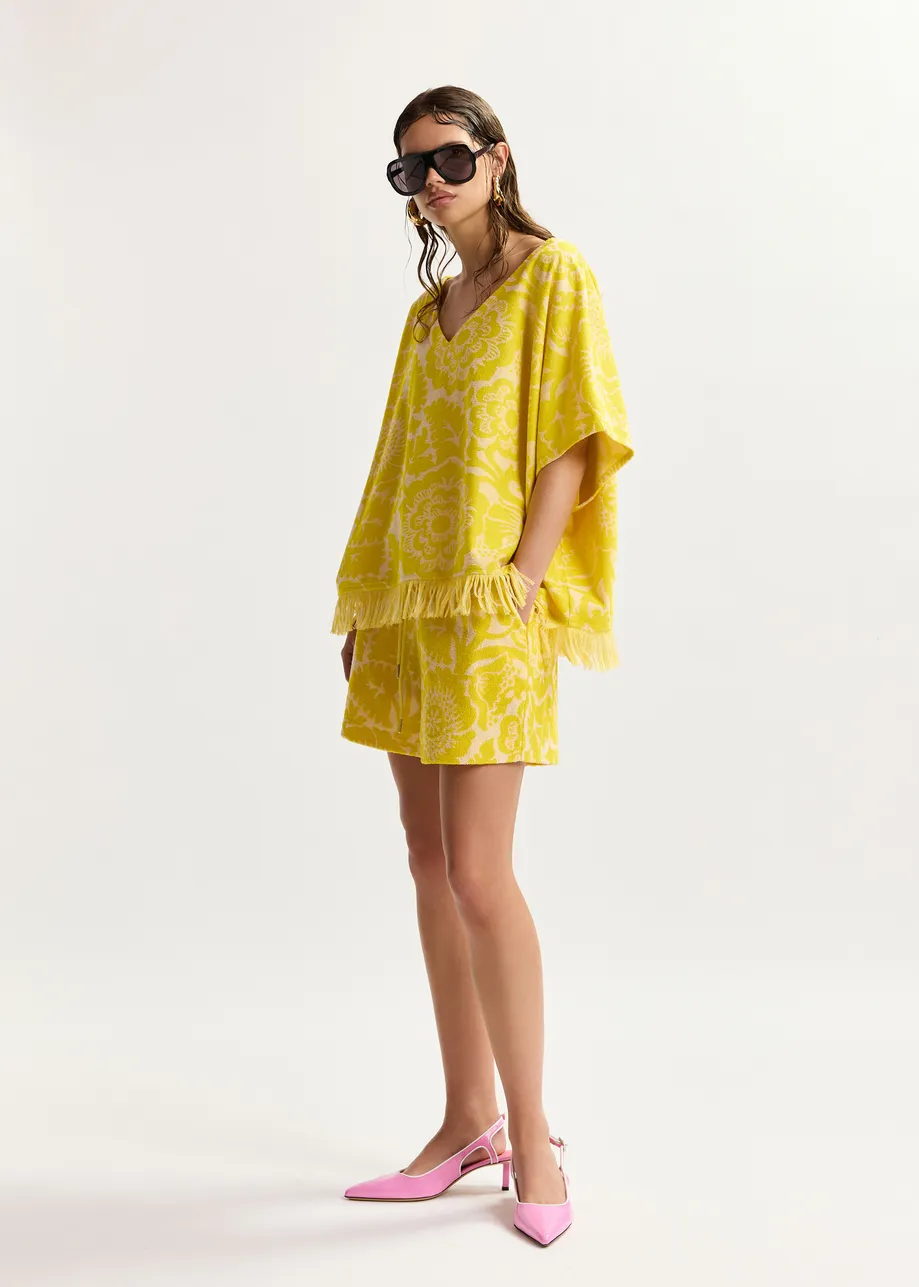 Maglia in misto cotone jacquard con motivo floreale giallo testurizzato e frange
