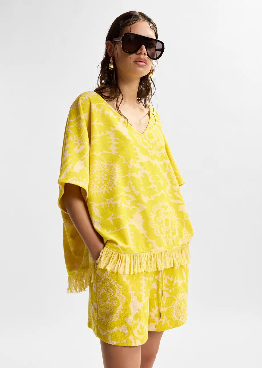 Yellow textured floral jacquard cotton-blend top with fringed trims