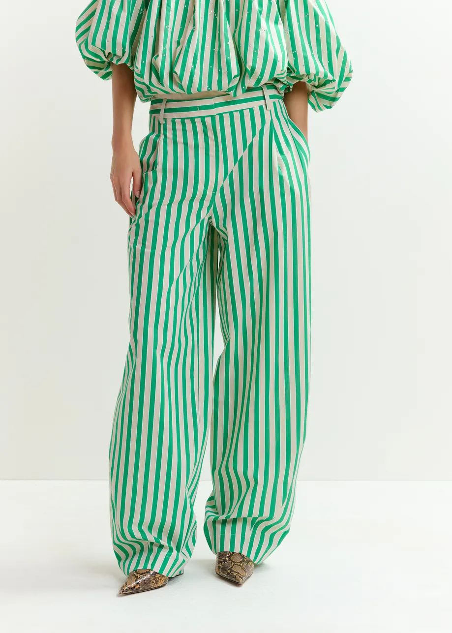 Green and cream striped tapered-leg pants with rhinestone embellishments