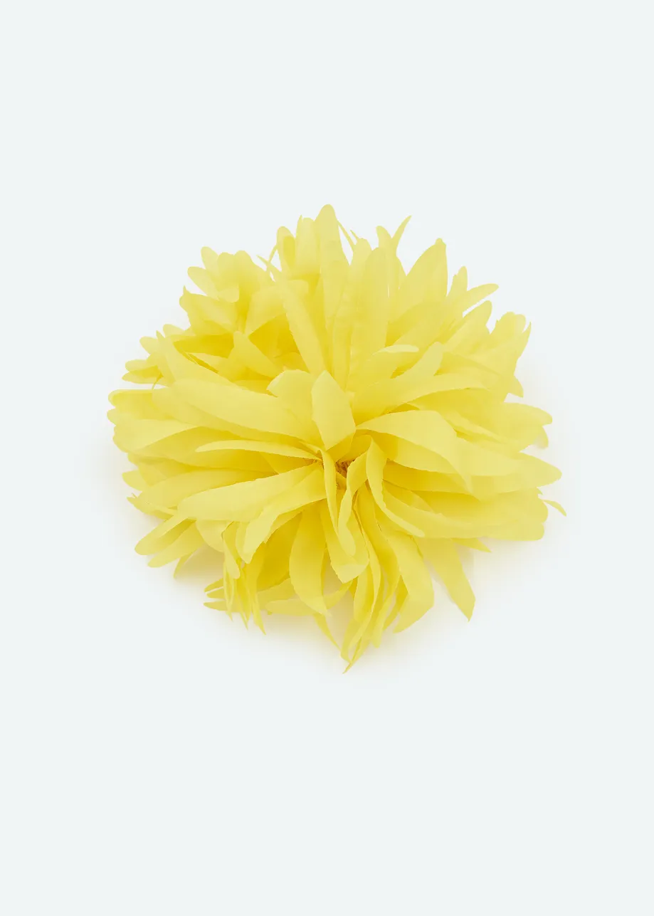 Yellow flower-shaped brooch