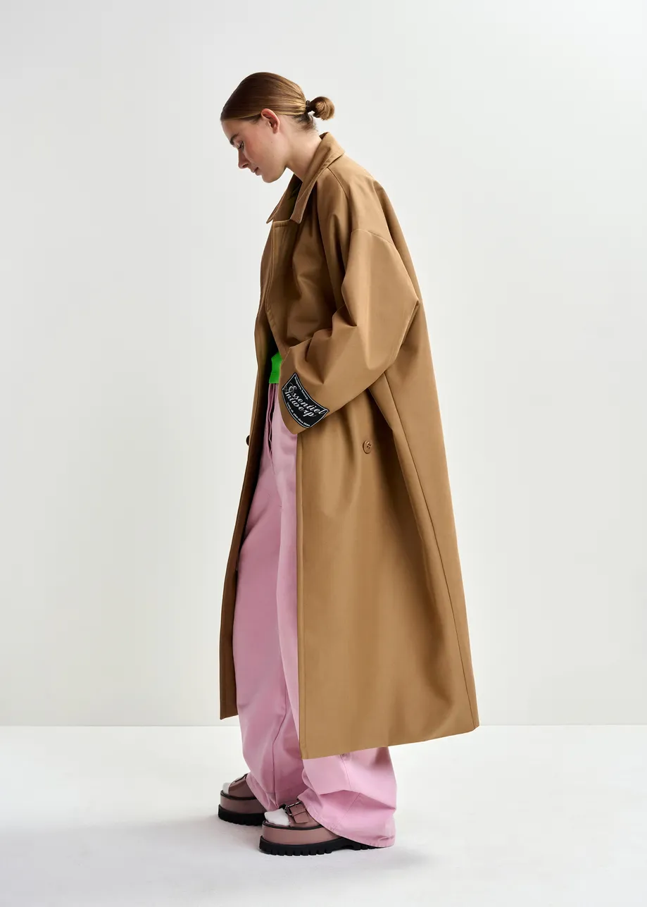Bruine oversized trenchcoat met merklabel