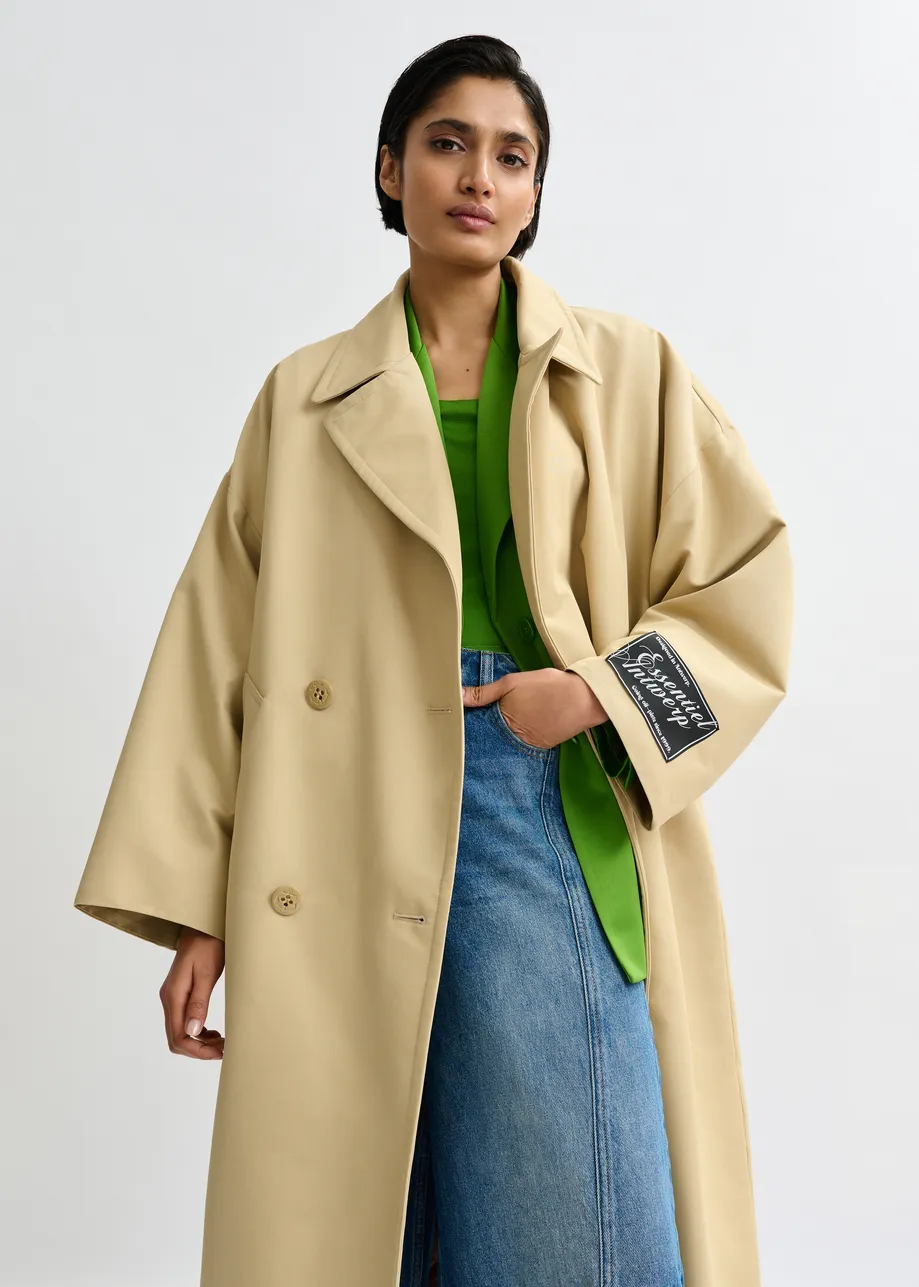 Lichtbeige oversized trenchcoat met merklabel
