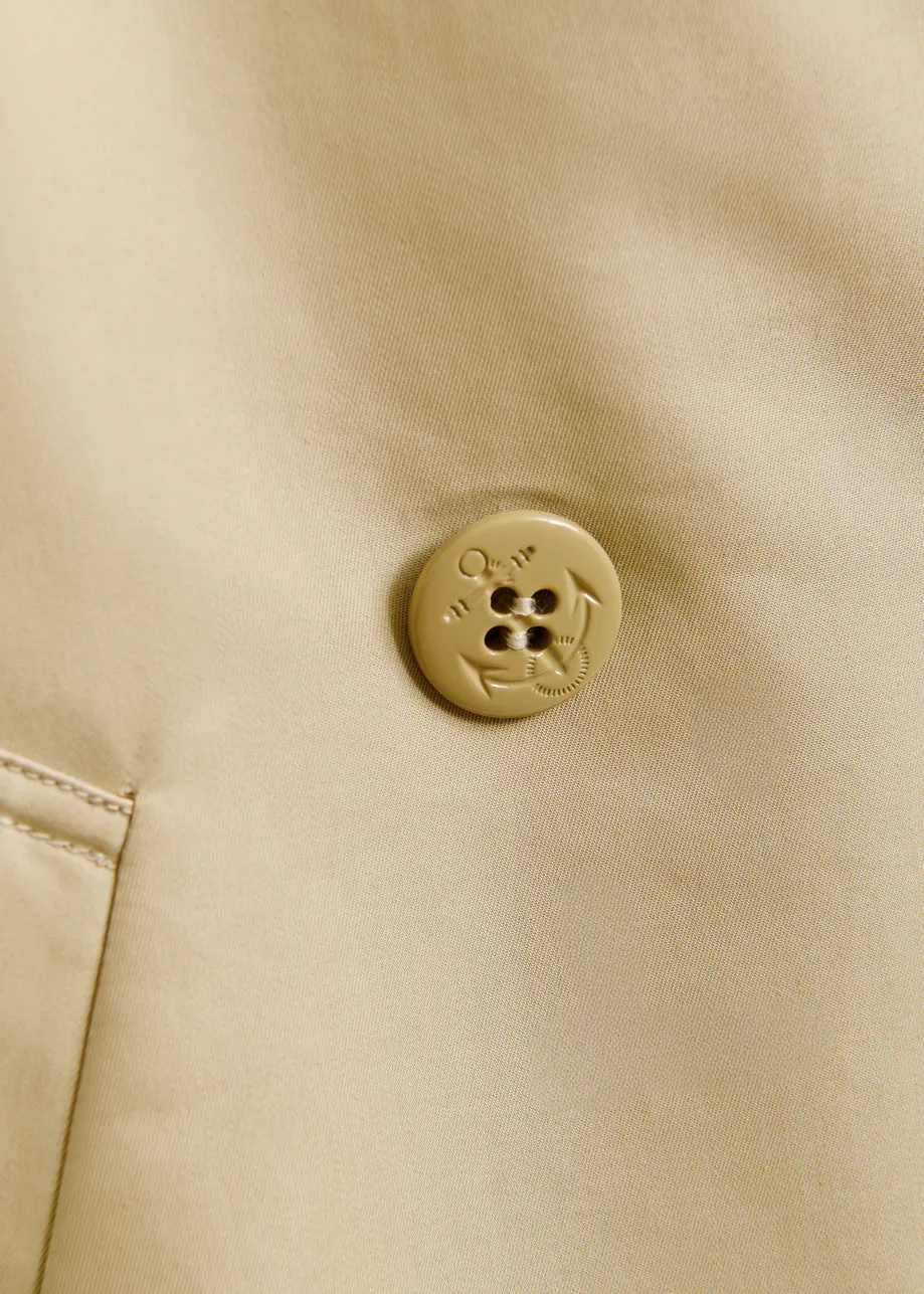 Lichtbeige oversized trenchcoat met merklabel