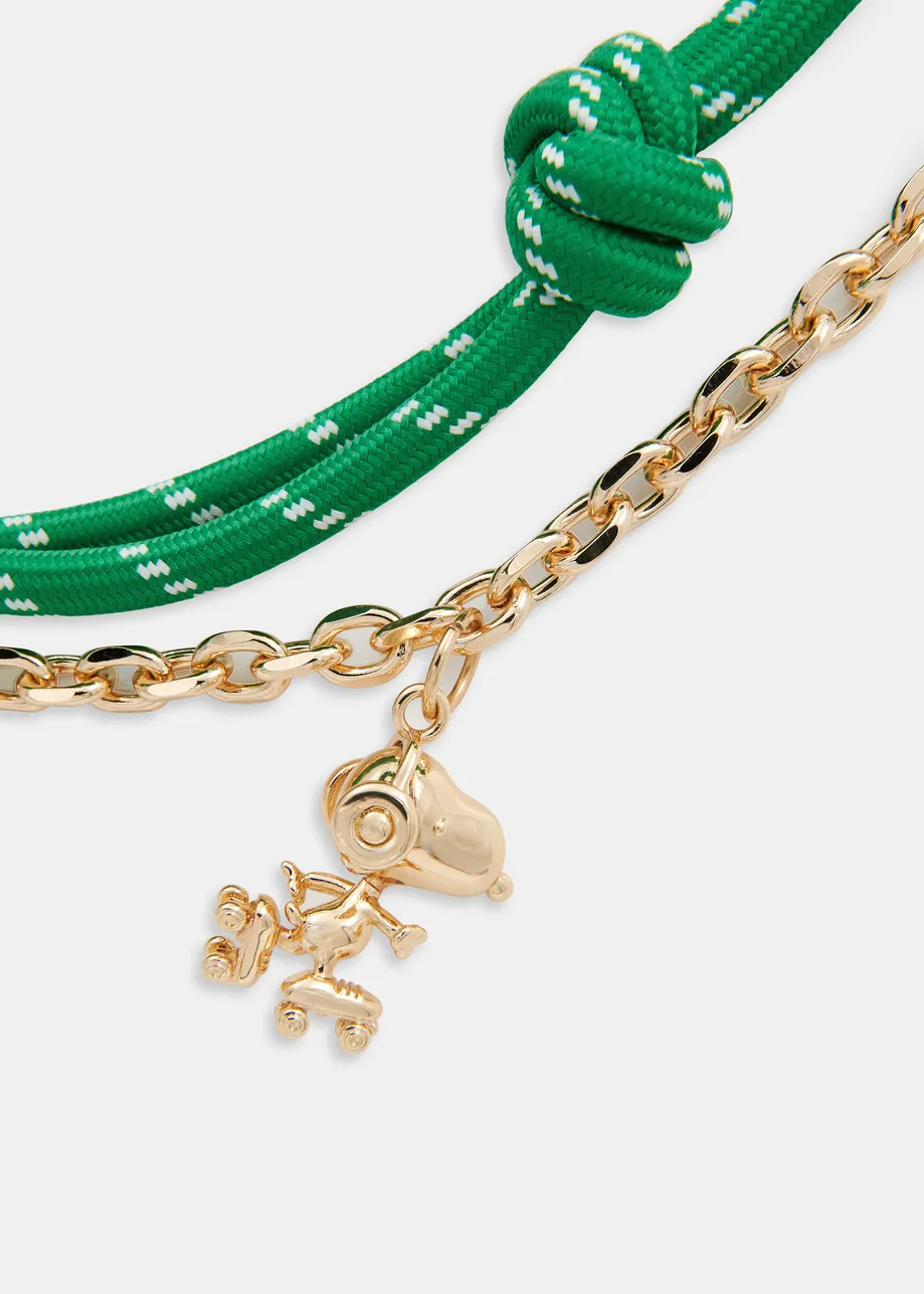 Green and gold-tone Peanuts™ Snoopy and Woodstock bag charm