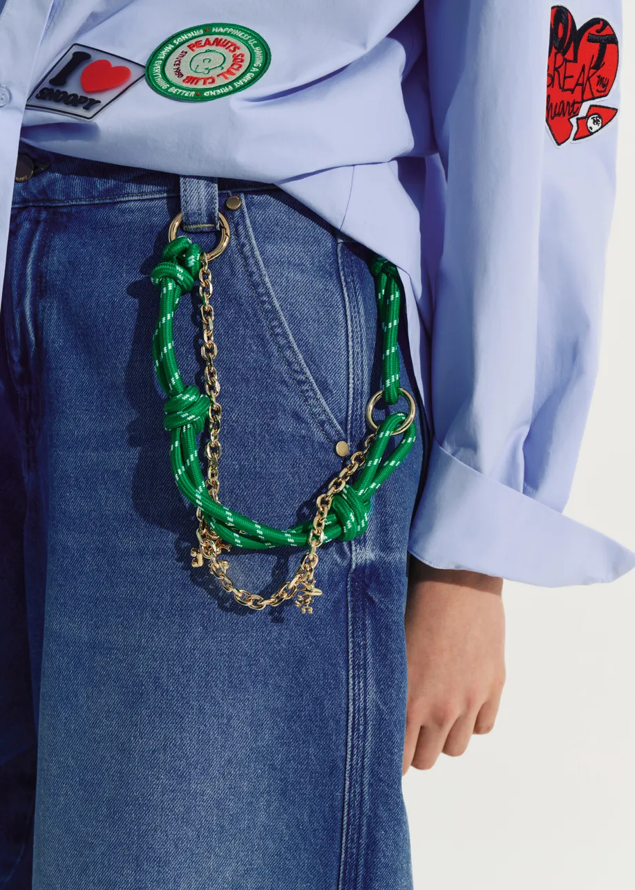 Green and gold-tone Peanuts™ Snoopy and Woodstock bag charm