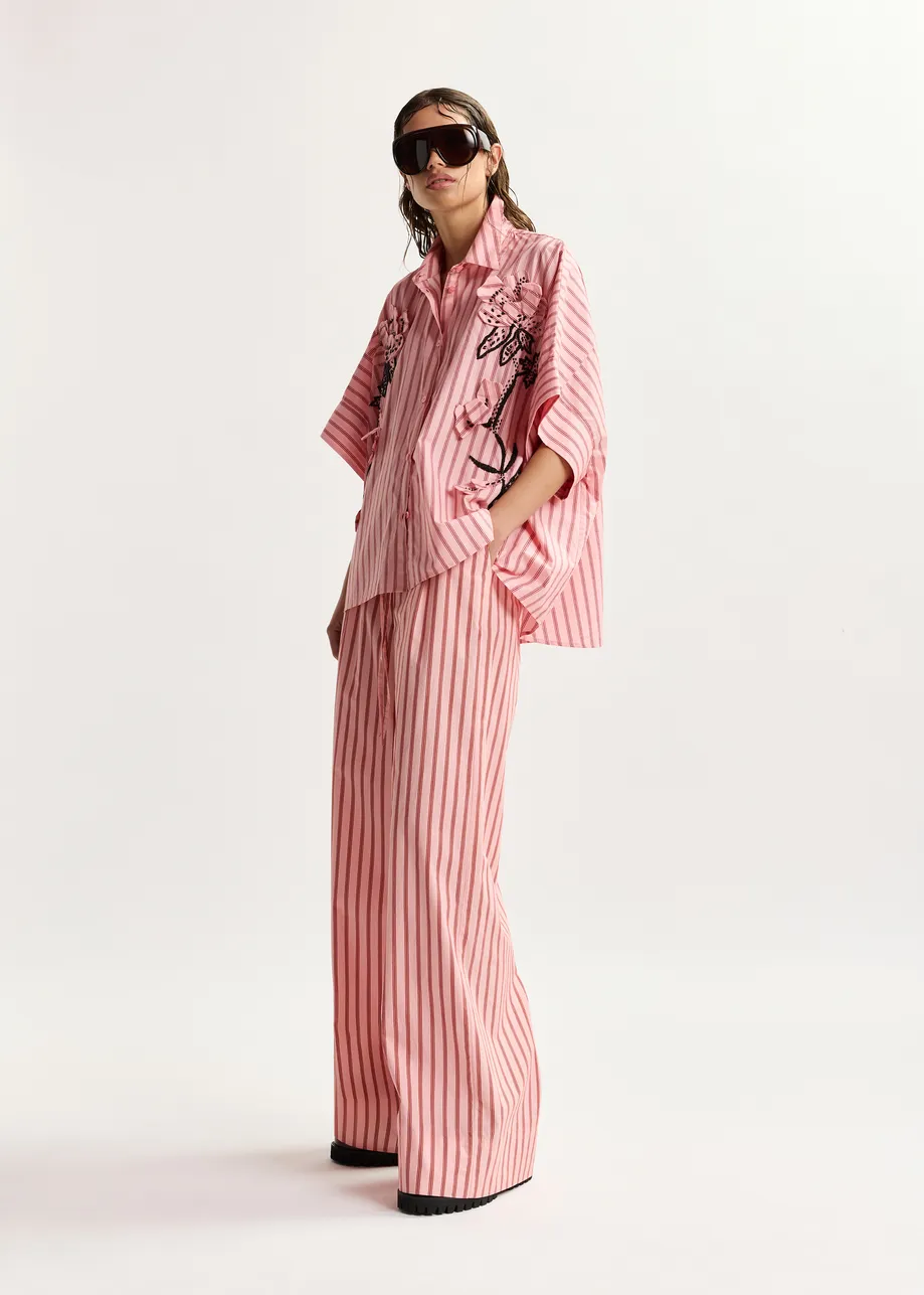 Pantalon large en coton à rayures rose et rouge