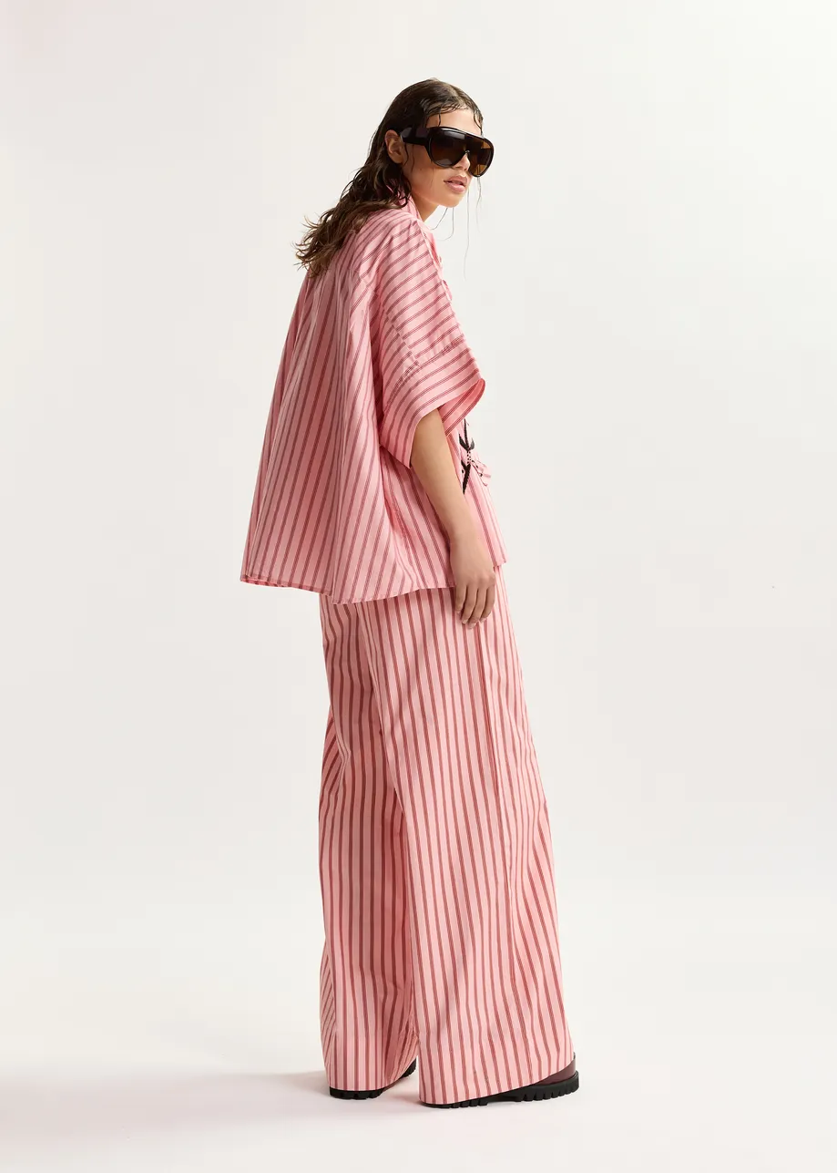 Pantalon large en coton à rayures rose et rouge