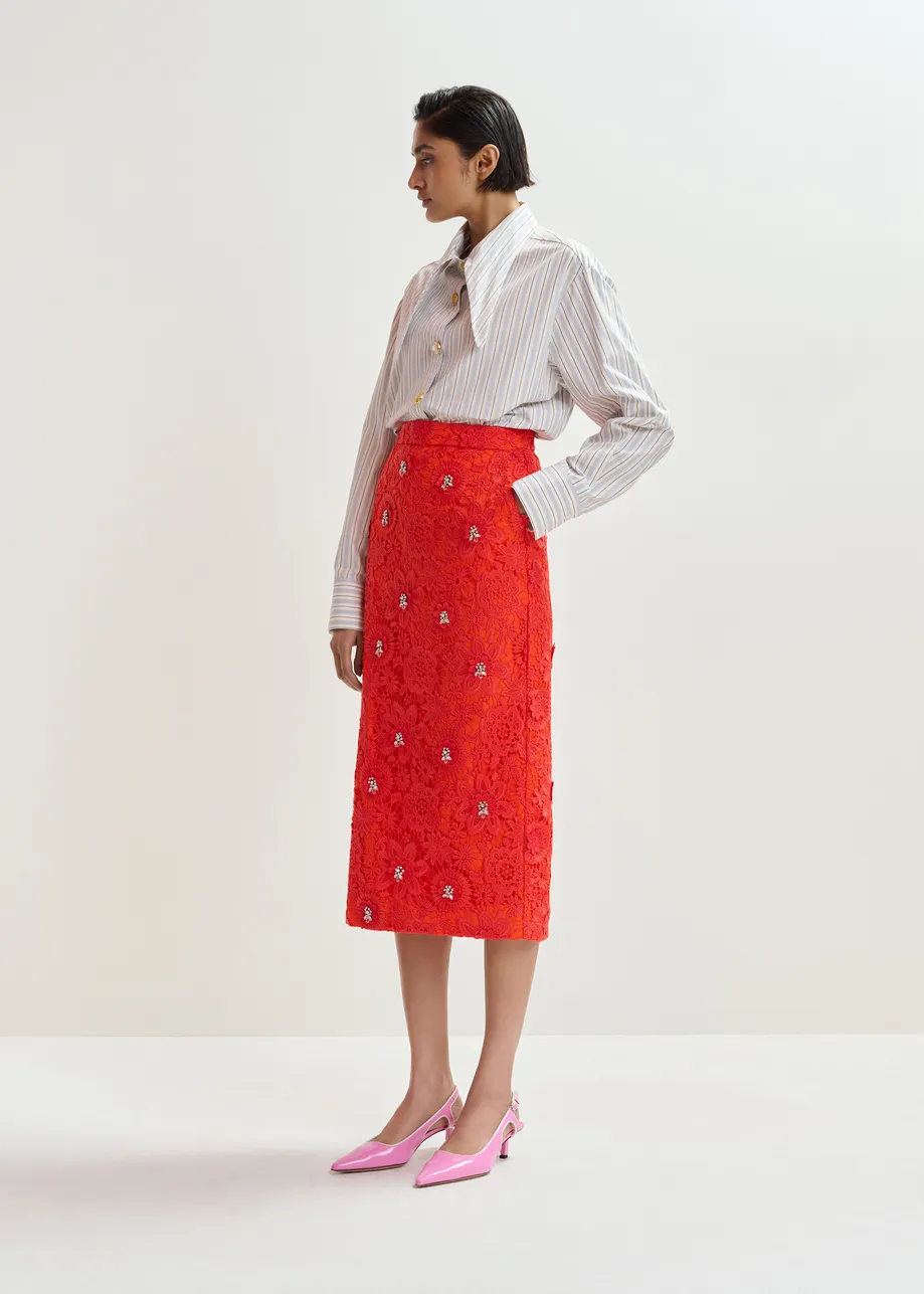 Oranje kokerrok in bloemenkant met stras