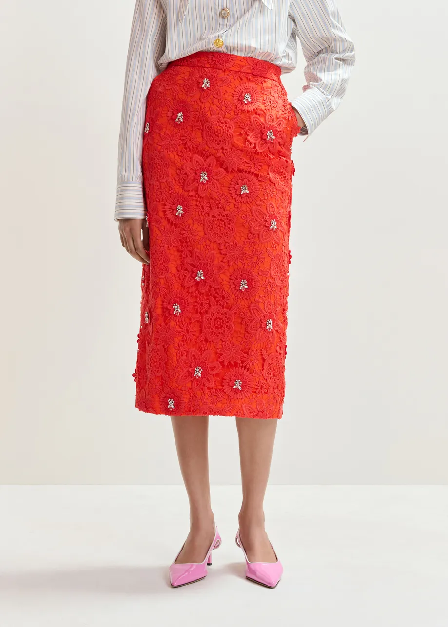 Oranje kokerrok in bloemenkant met stras