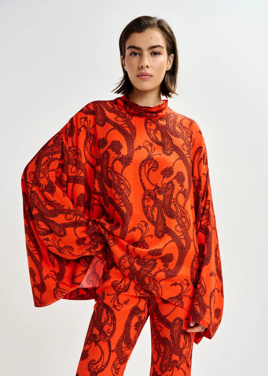 Oranje en zwarte oversized top met hoge halslijn en paisleyprint