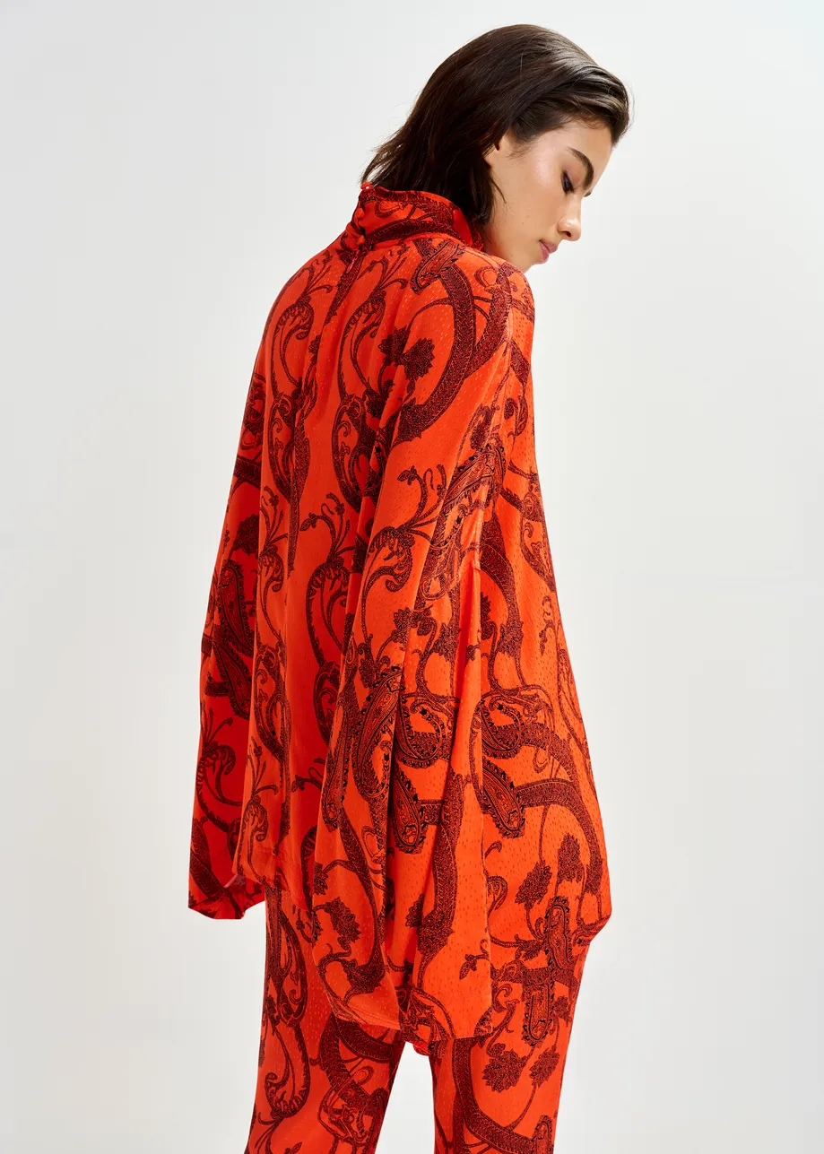 Oranje en zwarte oversized top met hoge halslijn en paisleyprint