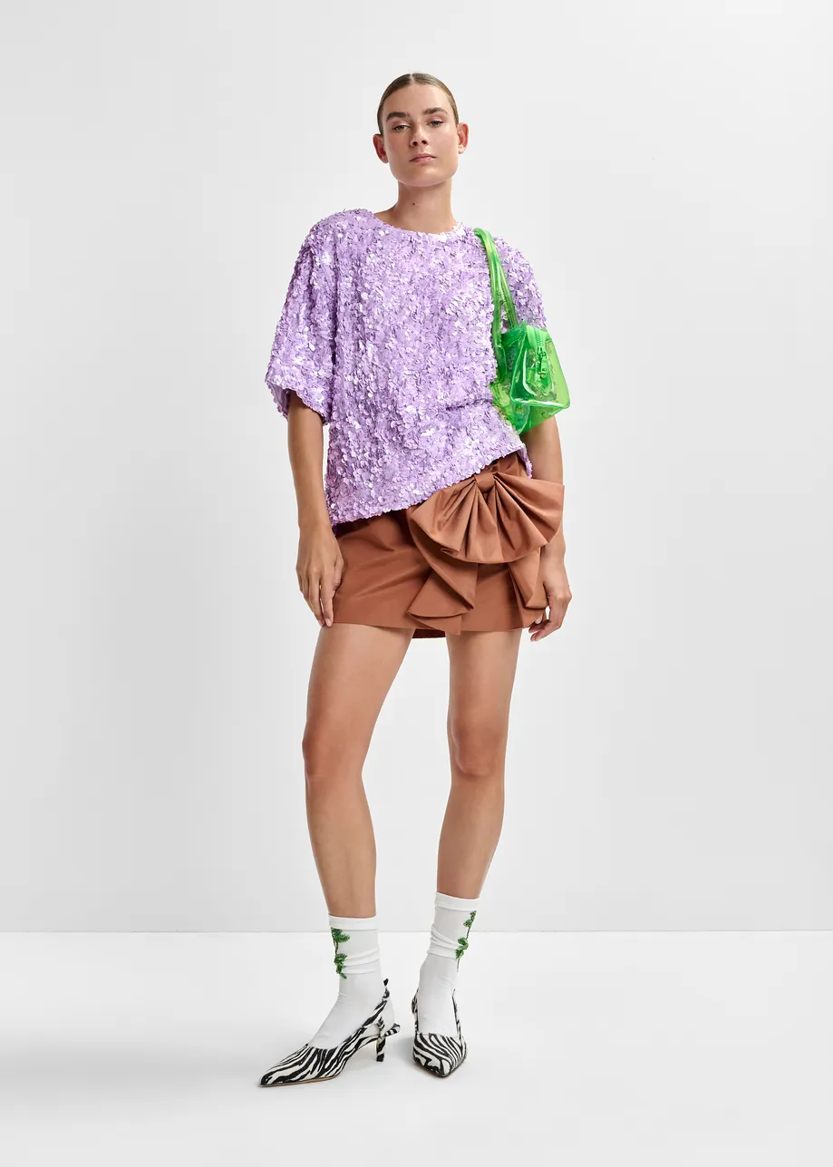 Brown cotton-blend mini skirt with appliquéd bow