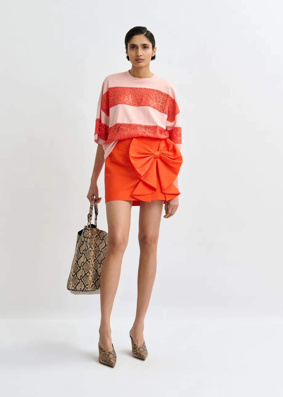 Mini-jupe rouge en coton mélangé avec nœud