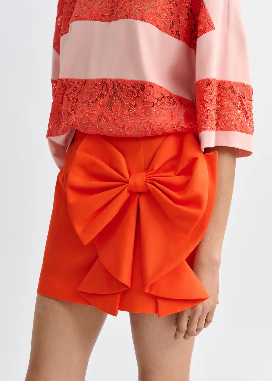 Mini-jupe rouge en coton mélangé avec nœud