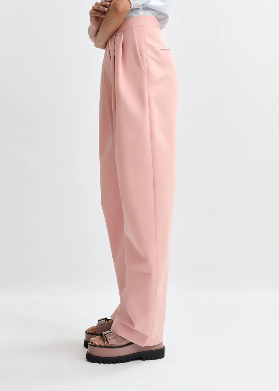 Light pink barrel-leg pants with pleated waist