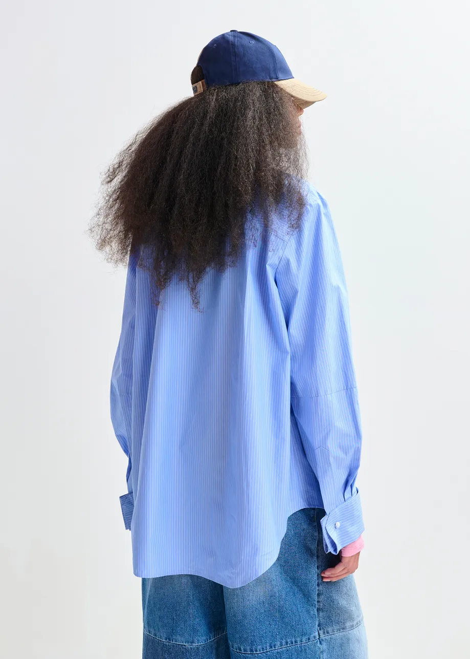 Blue and white pinstripe cotton shirt with red ribbon detail