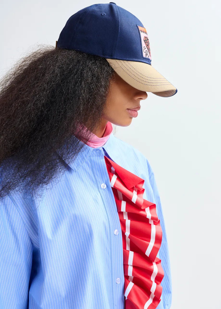 Blue and white pinstripe cotton shirt with red ribbon detail