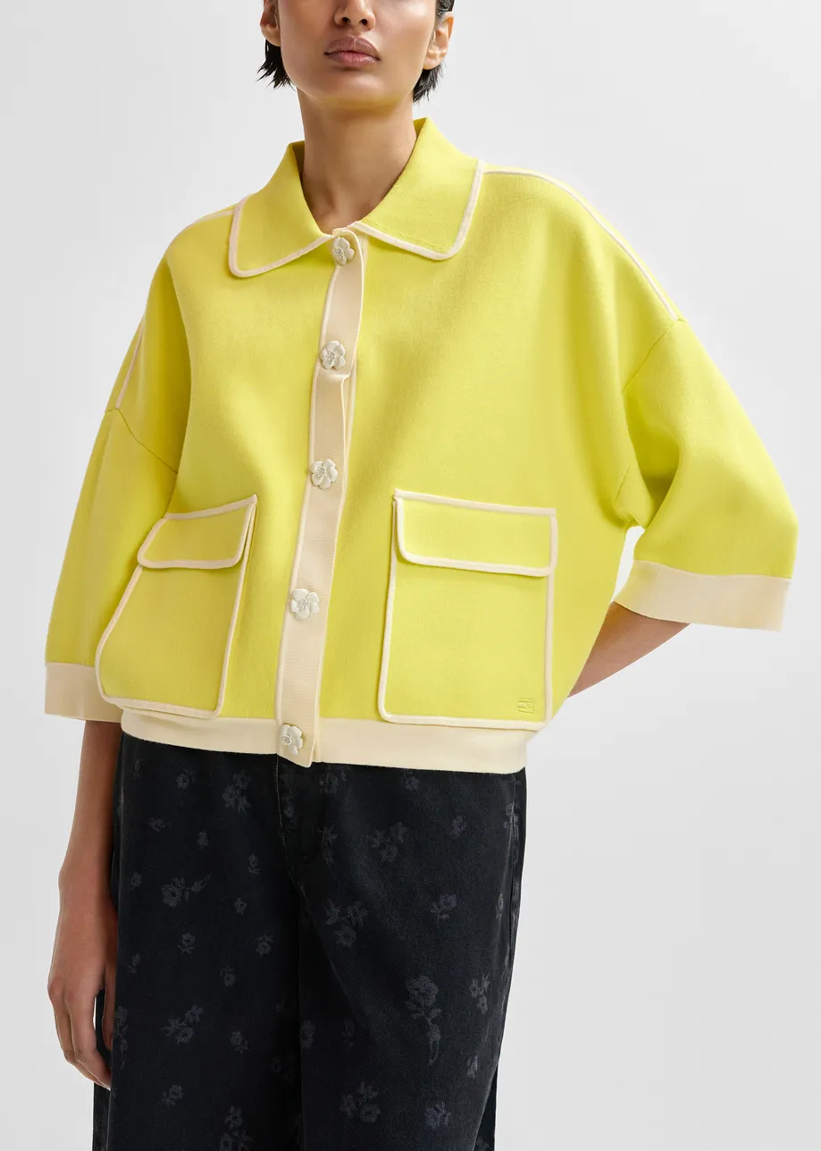 Yellow knit cardigan with flower buttons and off-white contrasting trims