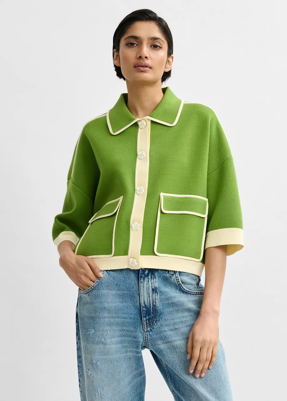 Green knit cardigan with flower buttons and off-white contrasting trims