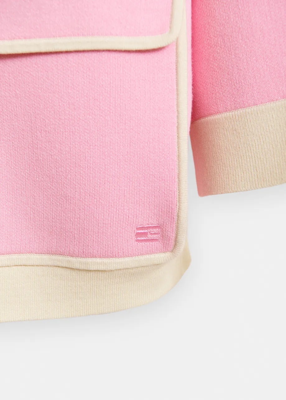 Pink knit cardigan with flower buttons and off-white contrasting trims